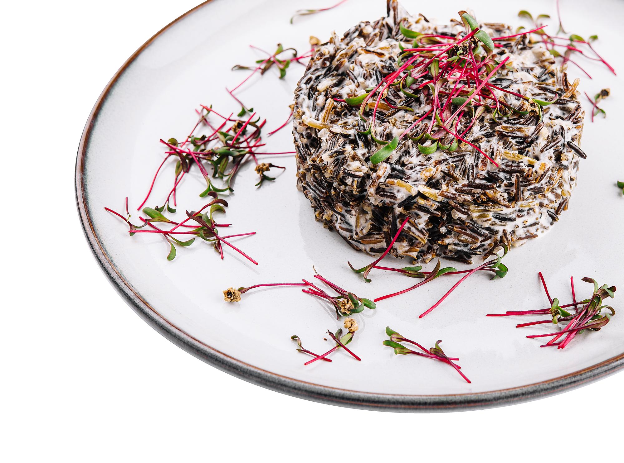 Close-up of plated dessert with microgreens